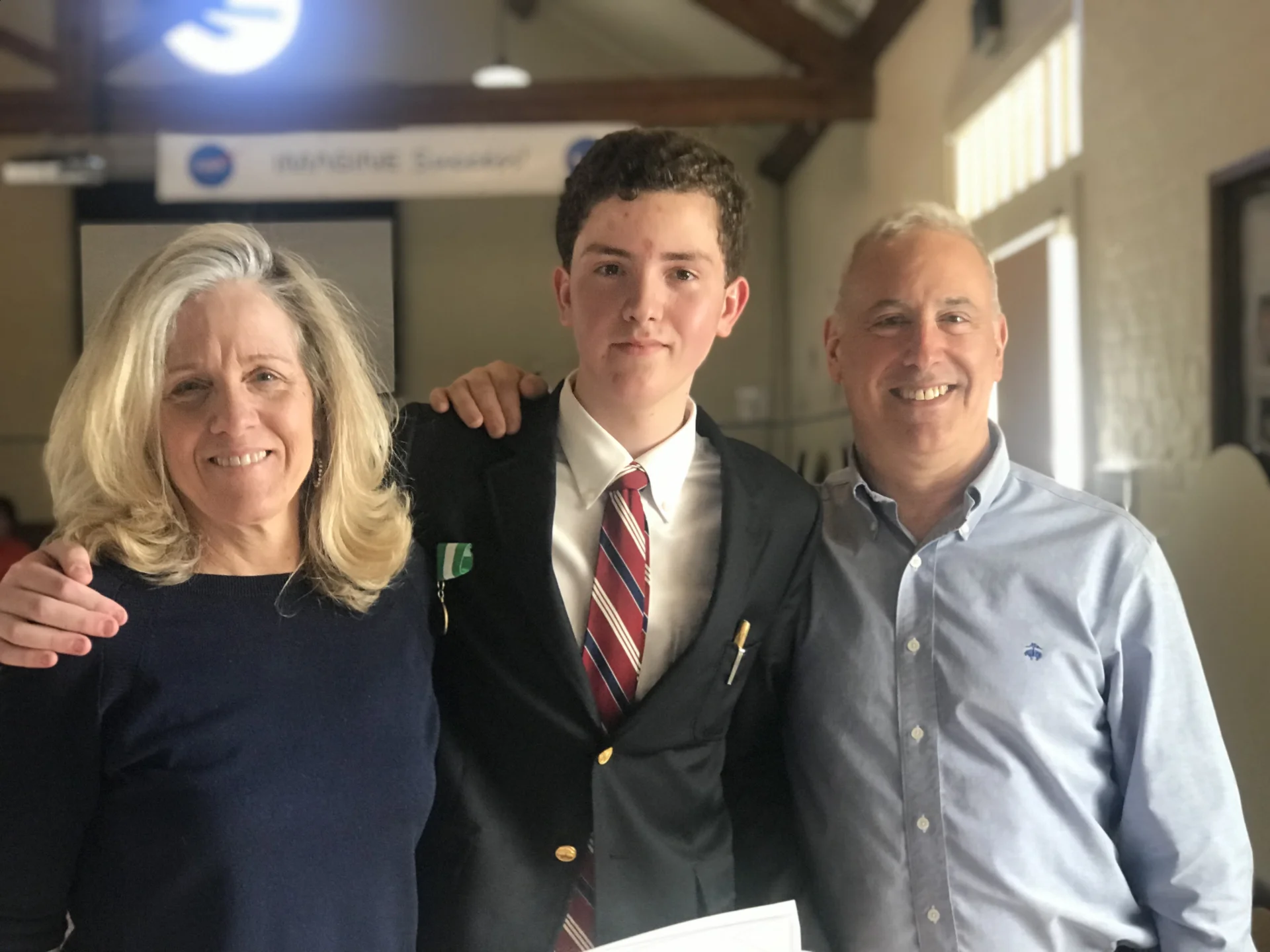 parents and student smiling